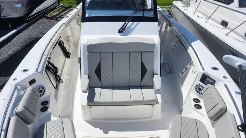Blown Dough Yacht Photos Pics 2023 Pursuit S 358 Sport boat interior with luxurious seating and modern design.