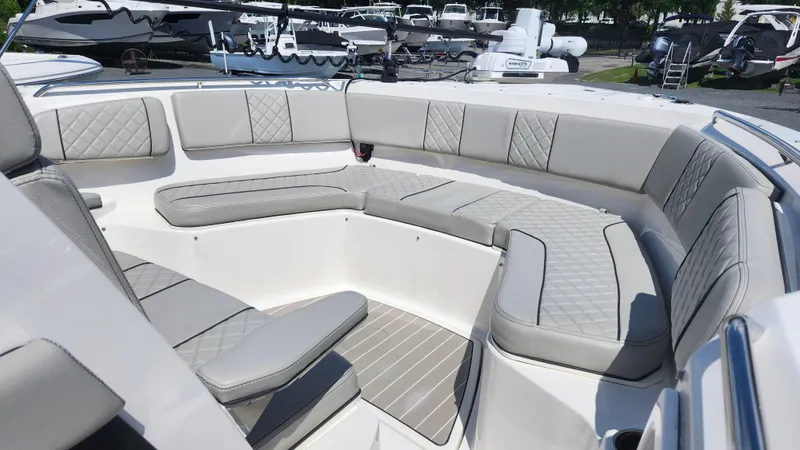 Blown Dough Yacht Photos Pics 2023 Pursuit S 358 Sport boat with luxurious seating and modern design.
