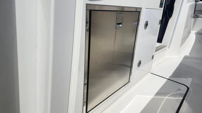 Blown Dough Yacht Photos Pics Stainless steel storage compartment on 2023 Pursuit S 358 Sport boat.