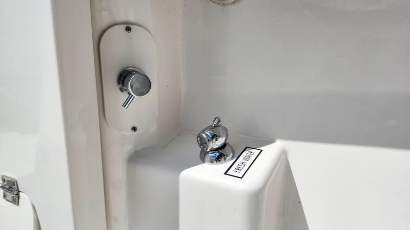 Blown Dough Yacht Photos Pics Fresh water outlet on 2023 Pursuit S 358 Sport boat.