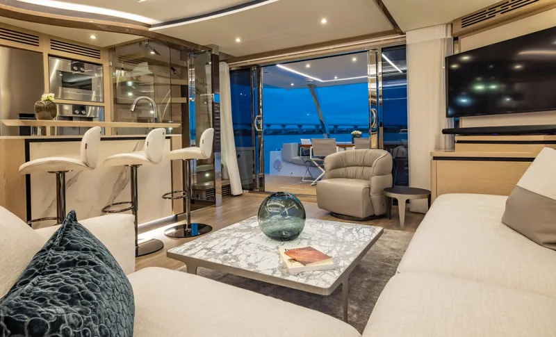 Aquila 70 Yacht Photos Pics Luxurious interior of 2026 Aquila 70 yacht with modern furnishings and elegant design.