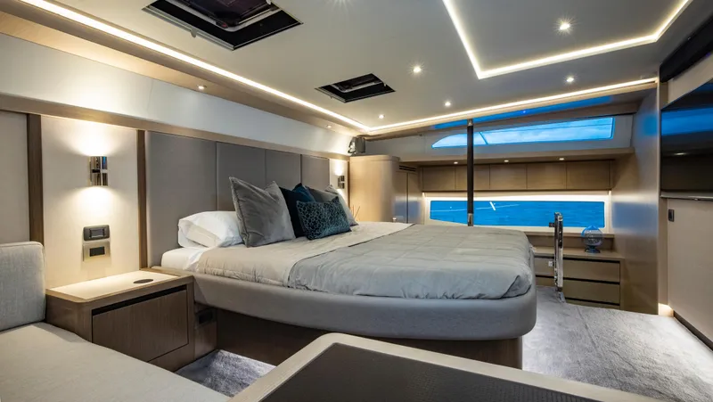 Aquila 70 Yacht Photos Pics Luxurious interior of 2026 Aquila 70 Luxury yacht with modern bedroom design.