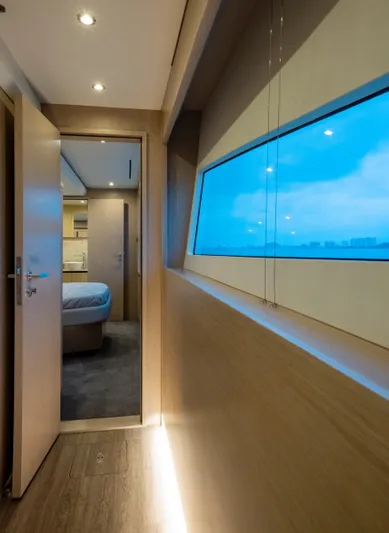 Aquila 70 Yacht Photos Pics Luxurious interior of 2026 Aquila 70 yacht, featuring modern design and large windows.