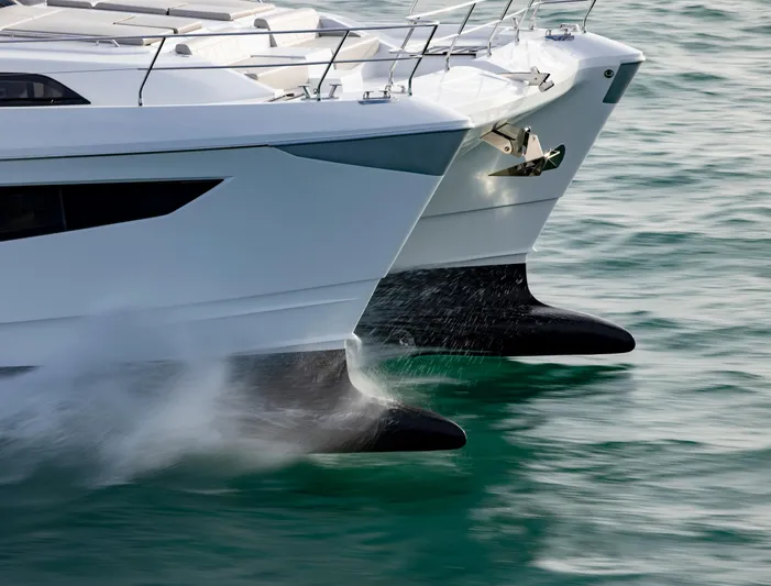 Aquila 70 Yacht Photos Pics Aquila 70 Luxury yacht cruising on water, 2026 model, sleek design.