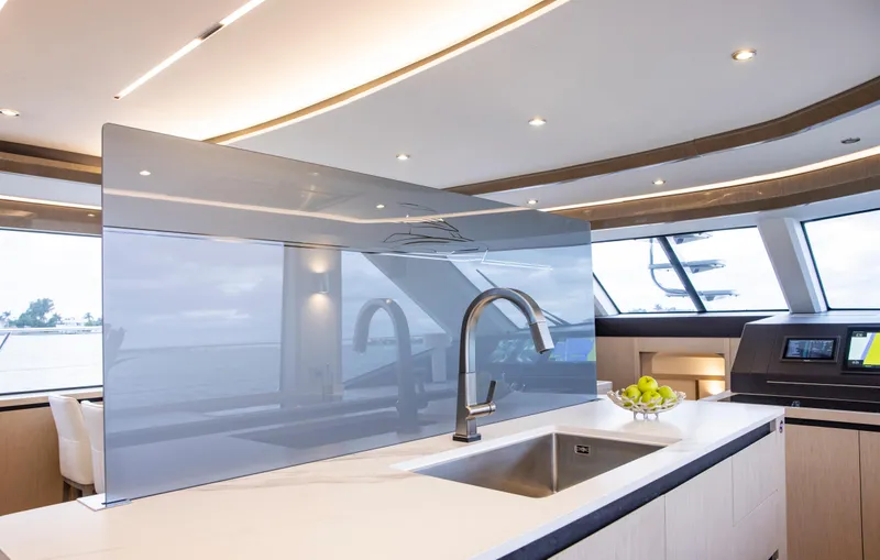Aquila 70 Yacht Photos Pics Luxurious kitchen interior of 2026 Aquila 70 Luxury yacht with modern design and sleek finishes.