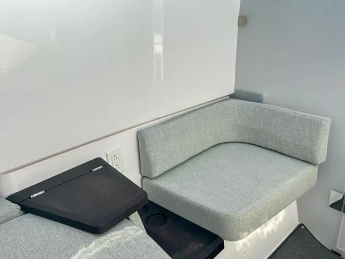  Yacht Photos Pics 2024 Axopar 37XC CROSS CABIN interior with modern seating and sleek design.