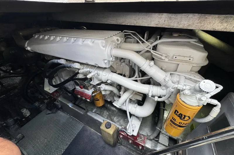  Yacht Photos Pics Engine compartment of a 1996 Sea Ray 500 Sedan Bridge with CAT filter visible.