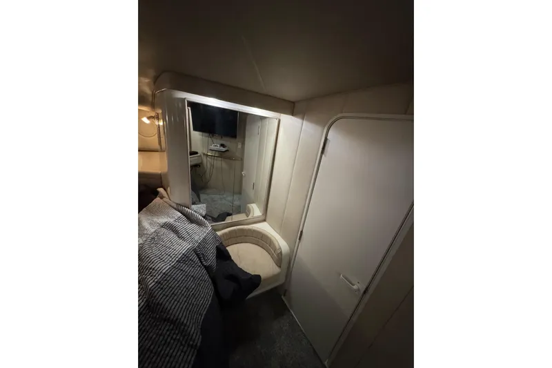  Yacht Photos Pics Interior of 1996 Sea Ray 500 Sedan Bridge, featuring cozy cabin and modern amenities.