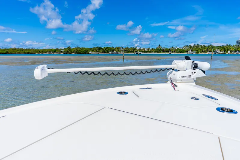  Yacht Photos Pics 2022 SeaVee 270Z boat with Minn Kota trolling motor on calm waters.