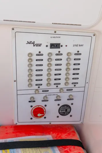  Yacht Photos Pics Control panel of 2022 SeaVee 270Z boat, featuring various switches and circuit breakers.