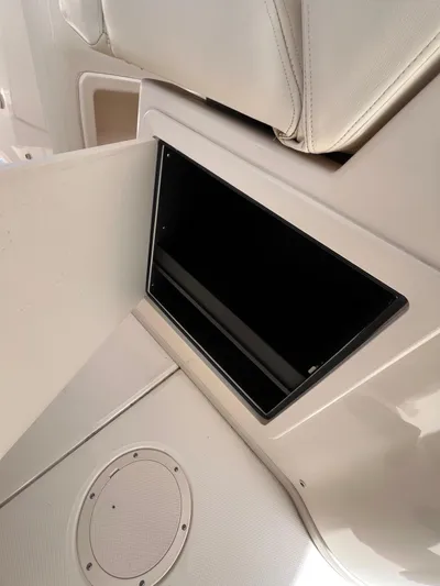  Yacht Photos Pics Storage compartment on a 2015 Grady-White Freedom 307 boat interior.