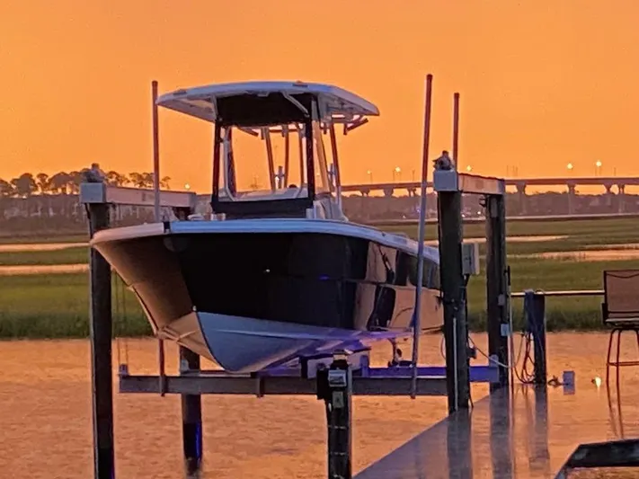  Yacht Photos Pics Custom Shark Fin R321 boat docked at sunset, 2025 model.