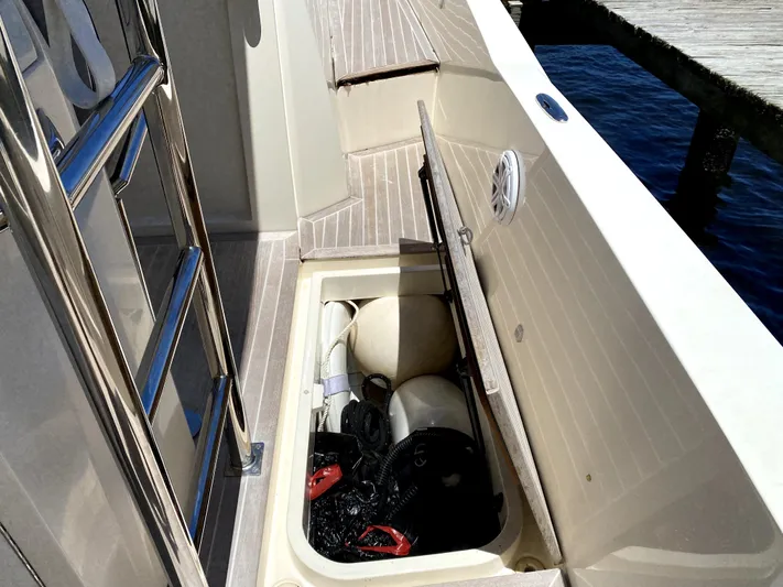  Yacht Photos Pics Open storage compartment on 2014 Azimut Atlantis Verve Outboard boat deck.