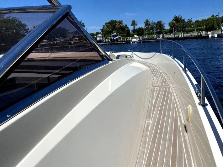  Yacht Photos Pics Azimut Atlantis Verve Outboard 2014 yacht deck with scenic waterfront view.