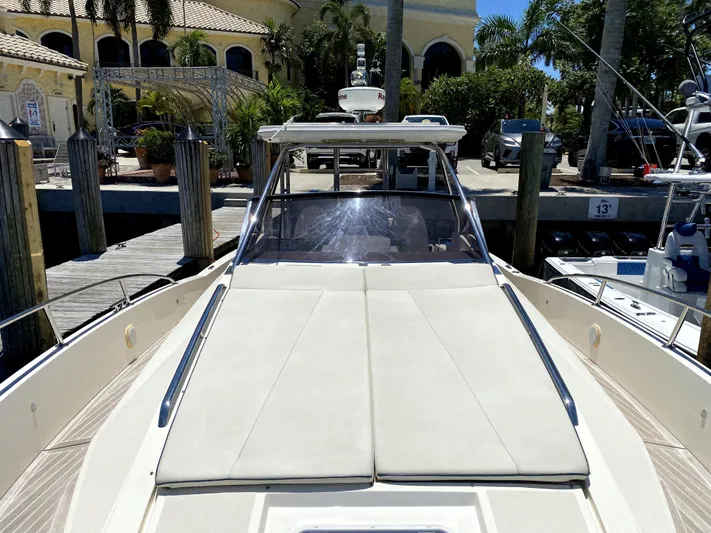  Yacht Photos Pics 2014 Azimut Atlantis Verve Outboard yacht docked at marina, featuring spacious sun deck.
