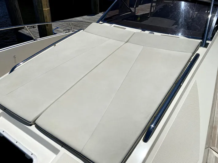  Yacht Photos Pics 2014 Azimut Atlantis Verve Outboard sun deck with beige cushions.