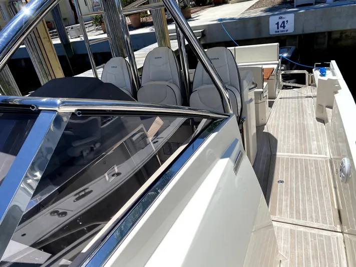  Yacht Photos Pics 2014 Azimut Atlantis Verve Outboard boat interior with seating and deck view.