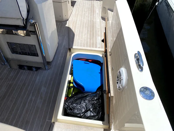  Yacht Photos Pics Azimut Atlantis Verve Outboard 2014 boat storage compartment with gear and equipment.