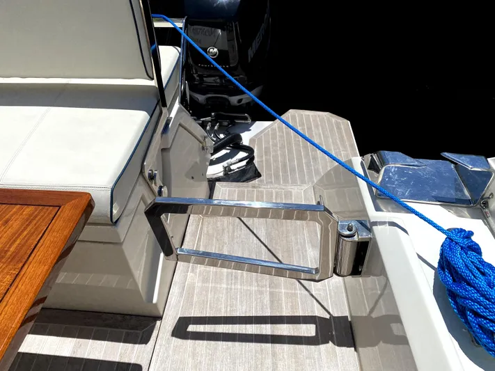  Yacht Photos Pics Azimut Atlantis Verve Outboard 2014 boat deck with seating and blue rope.