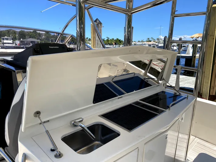  Yacht Photos Pics Azimut Atlantis Verve Outboard 2014 yacht with outdoor kitchen and sink at marina.