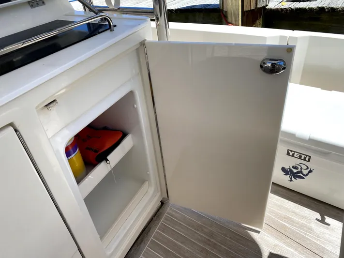  Yacht Photos Pics Open storage cabinet on 2014 Azimut Atlantis Verve Outboard boat deck.