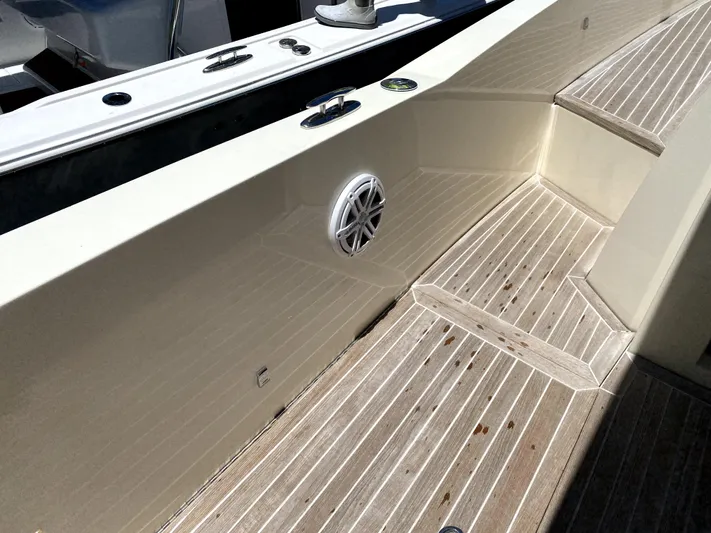  Yacht Photos Pics Azimut Atlantis Verve Outboard 2014 boat deck with wood flooring and speaker.