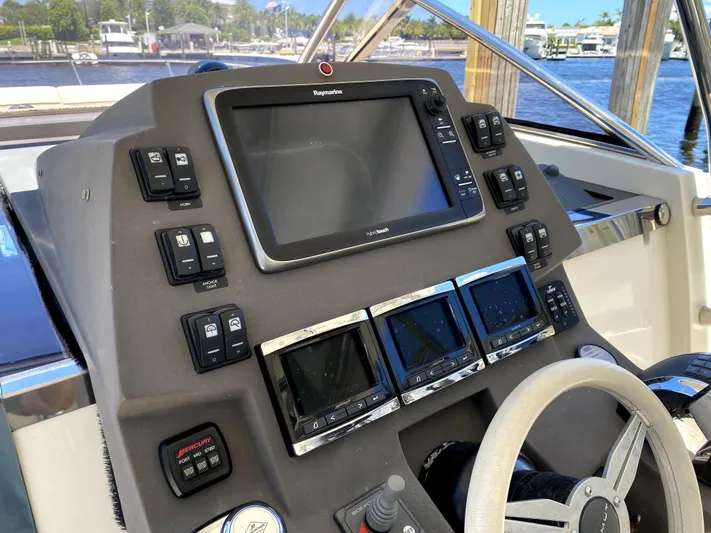  Yacht Photos Pics Control panel of 2014 Azimut Atlantis Verve Outboard boat with navigation system.