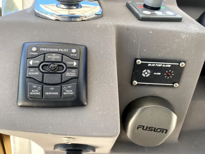  Yacht Photos Pics Control panel of a 2014 Azimut Atlantis Verve Outboard boat with precision pilot and bilge pump alarm.