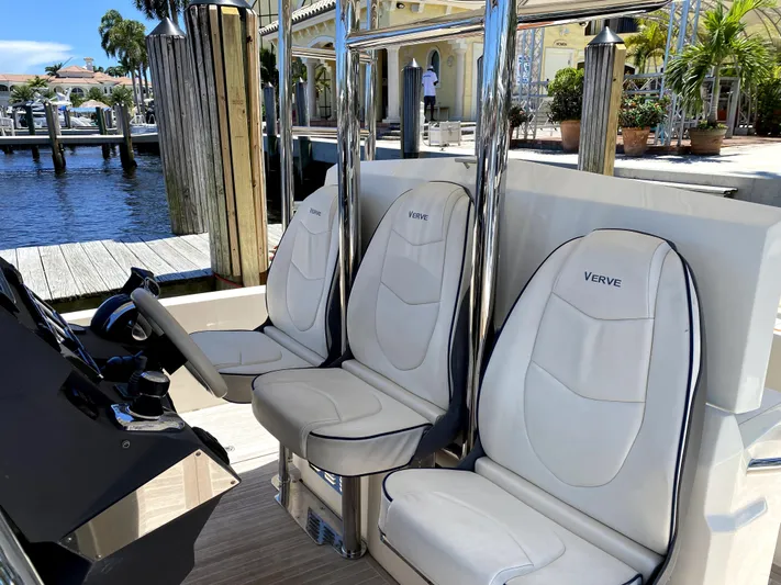  Yacht Photos Pics Azimut Atlantis Verve Outboard 2014 boat interior with sleek white seating.