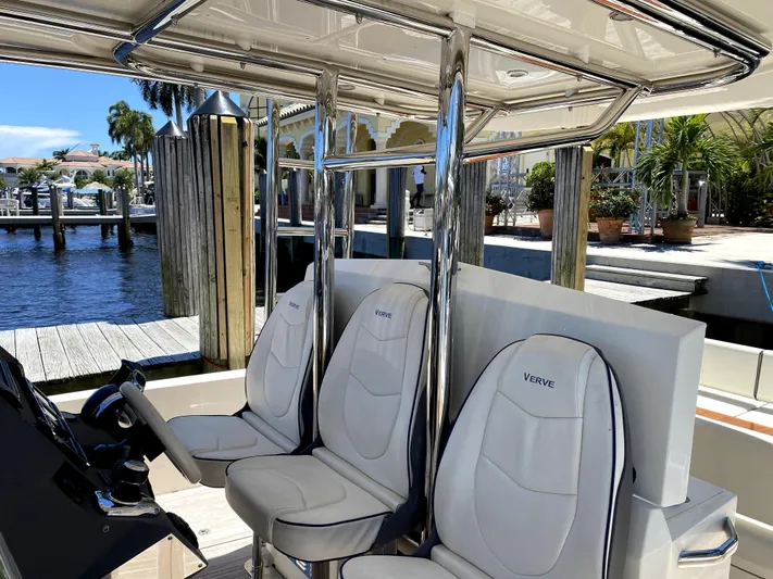  Yacht Photos Pics Azimut Atlantis Verve Outboard 2014 boat interior with sleek seating and waterfront view.