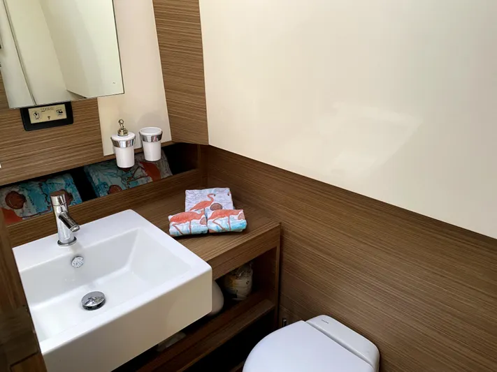  Yacht Photos Pics Modern bathroom in 2014 Azimut Atlantis Verve Outboard yacht with sink and toilet.