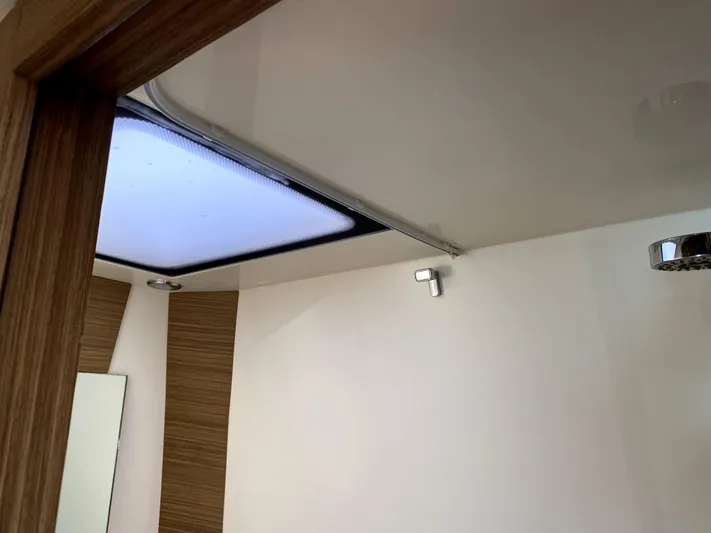  Yacht Photos Pics Interior ceiling view of 2014 Azimut Atlantis Verve Outboard yacht with modern lighting.