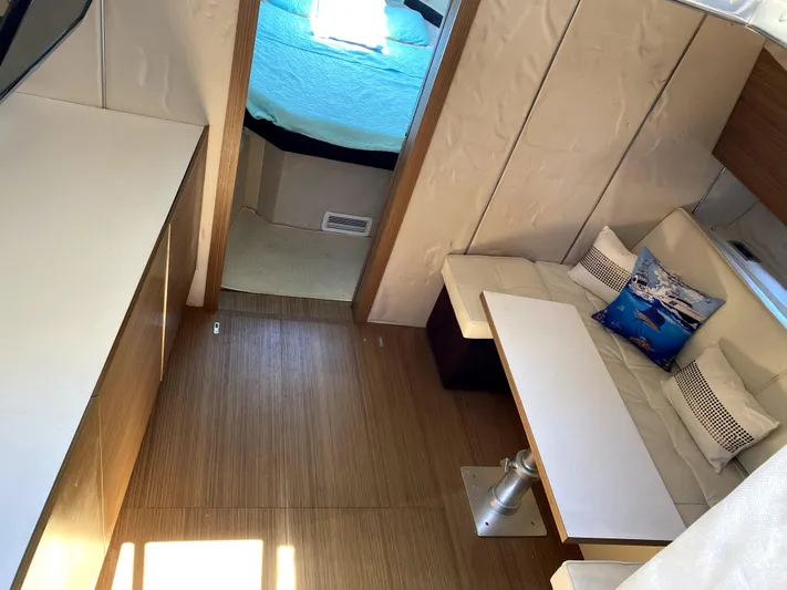 Yacht Photos Pics Interior of 2014 Azimut Atlantis Verve Outboard yacht with modern seating and cozy cabin.