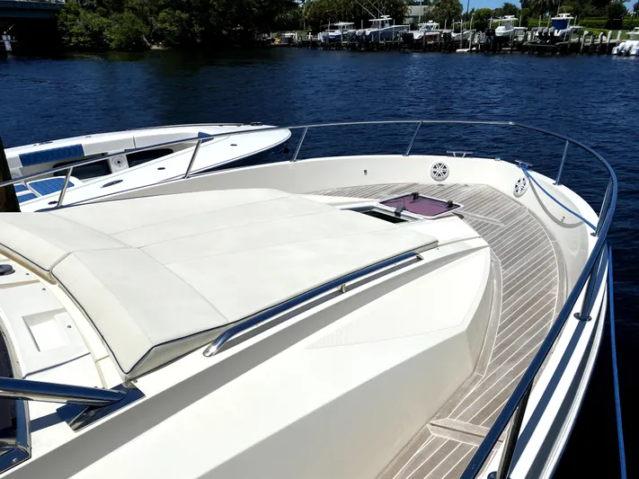  Yacht Photos Pics 2014 Azimut Atlantis Verve Outboard yacht on calm water, featuring spacious deck.