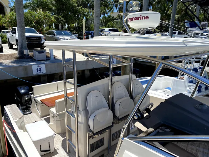  Yacht Photos Pics 2014 Azimut Atlantis Verve Outboard boat docked, featuring sleek seating and modern design.