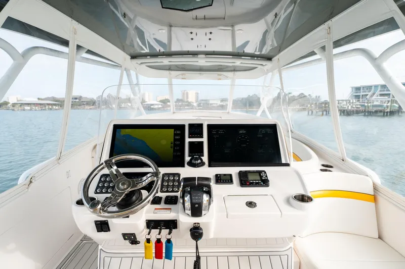  Yacht Photos Pics 2020 Intrepid 407 Cuddy helm with advanced navigation and control systems.