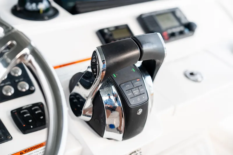  Yacht Photos Pics Close-up of 2020 Intrepid 407 Cuddy boat controls and steering wheel.