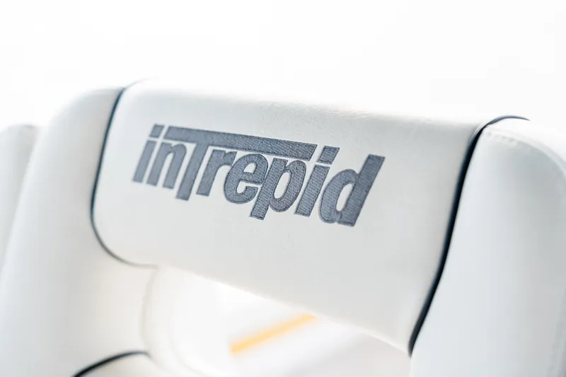  Yacht Photos Pics White leather seat with "Intrepid" logo, 2020 Intrepid 407 Cuddy boat.