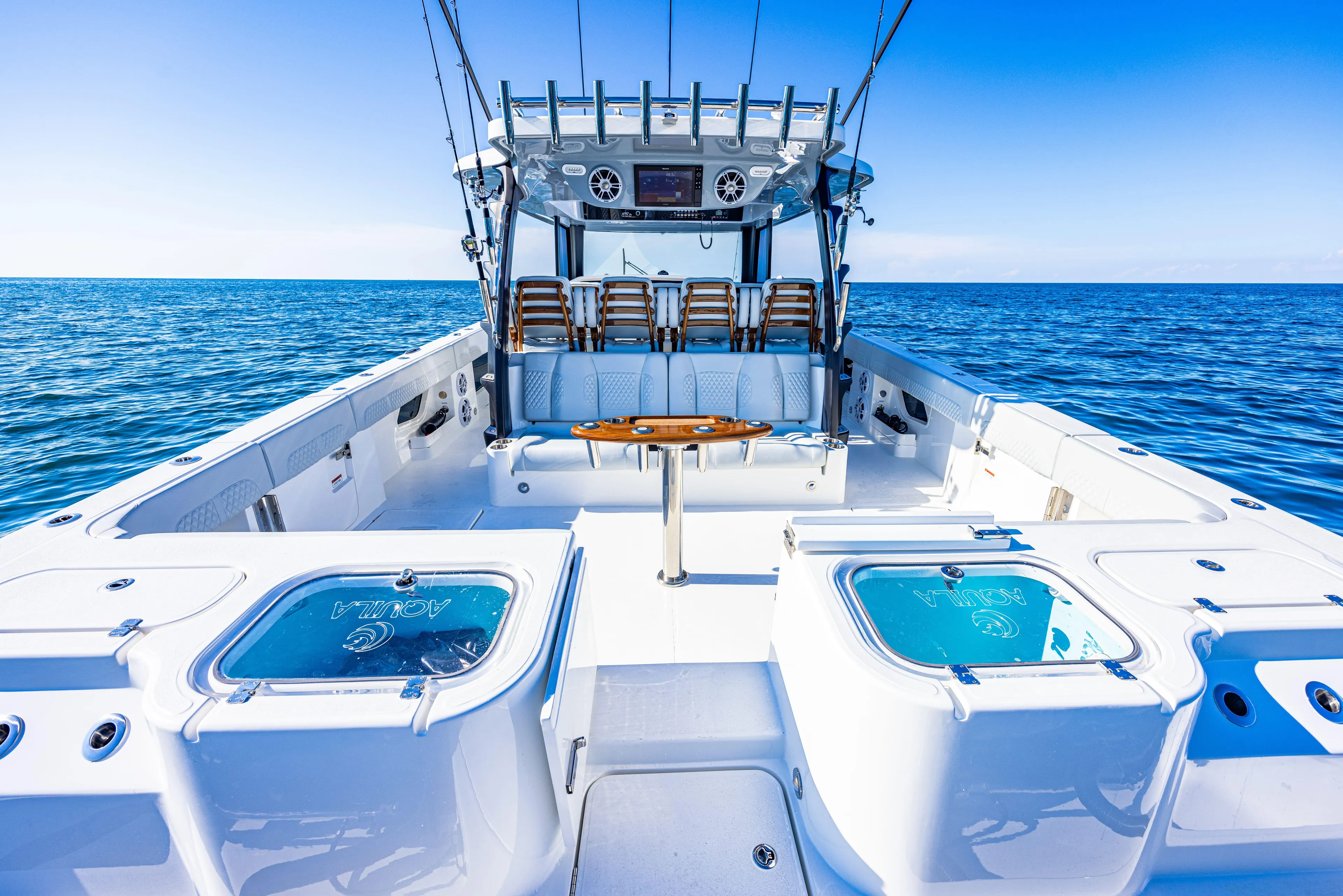  Yacht Photos Pics 2024 Aquila 47 Molokai boat with spacious deck and ocean view.