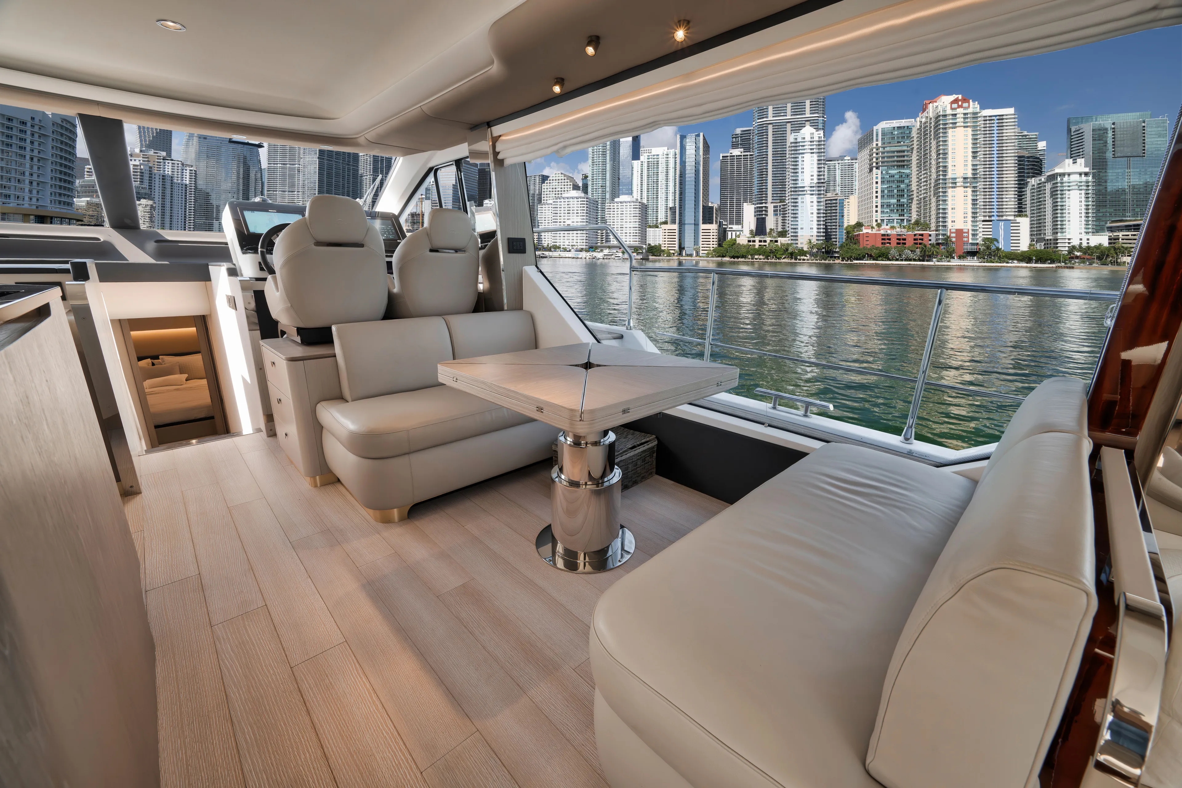  Yacht Photos Pics Luxurious interior of 2022 Azimut Flybridge with cityscape view.