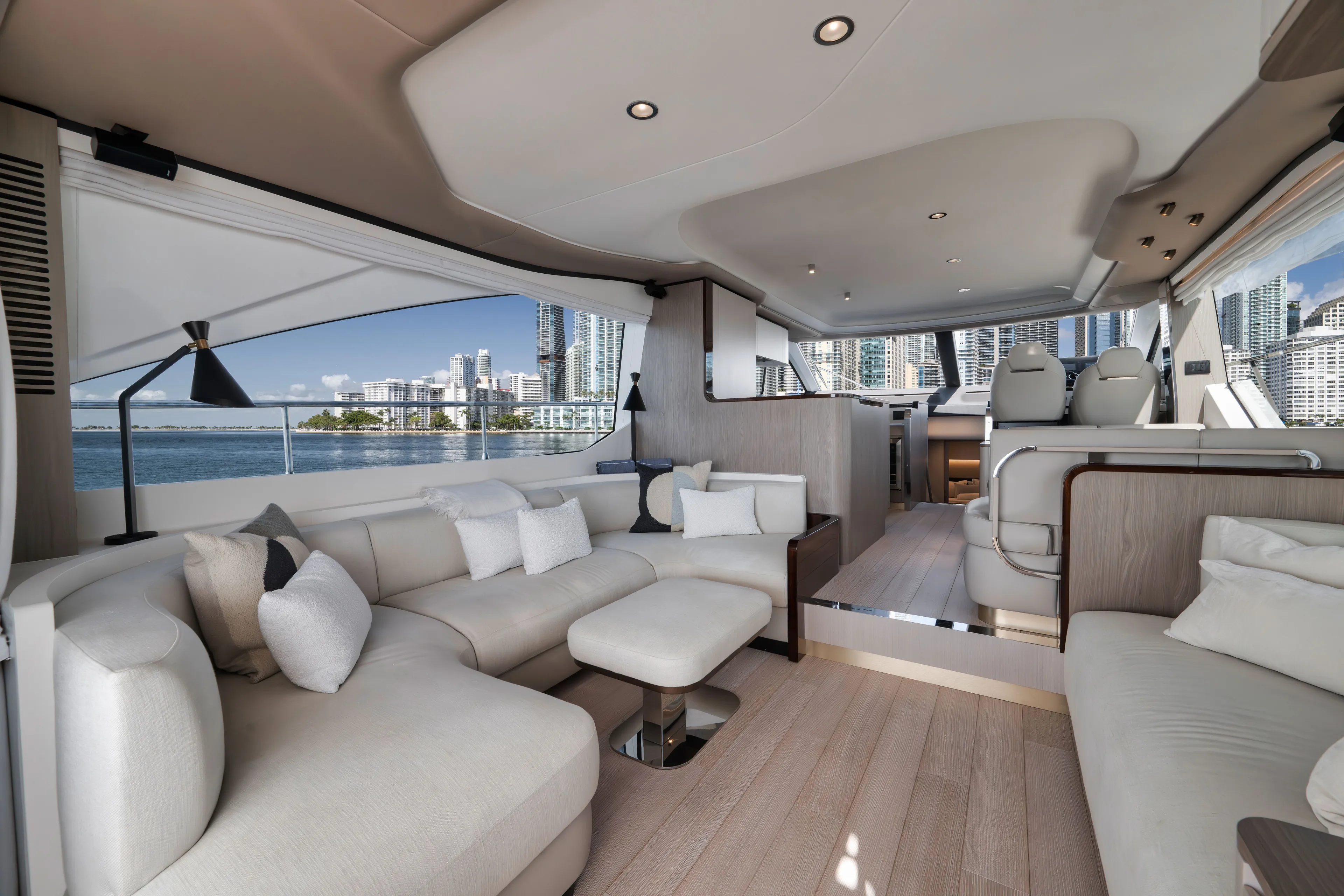  Yacht Photos Pics Luxurious interior of 2022 Azimut Flybridge yacht with city view.