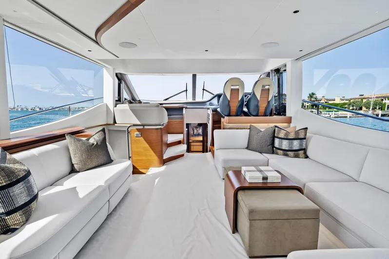 Robri Mar Yacht Photos Pics Luxurious interior of 2023 Princess Y72 yacht with elegant seating and ocean view.