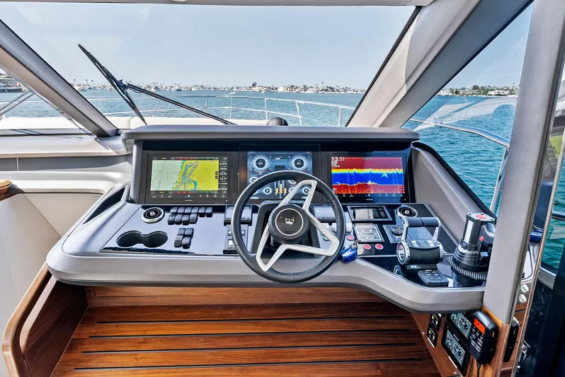 Robri Mar Yacht Photos Pics Luxury yacht Princess Y72 2023 helm with advanced navigation systems and ocean view.