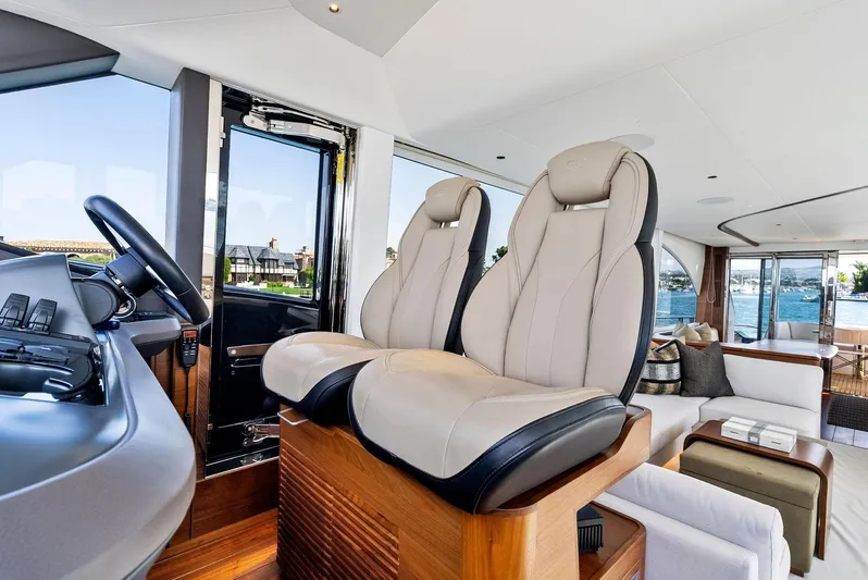 Robri Mar Yacht Photos Pics Luxurious interior of 2023 Princess Y72 yacht with plush seating and modern design.