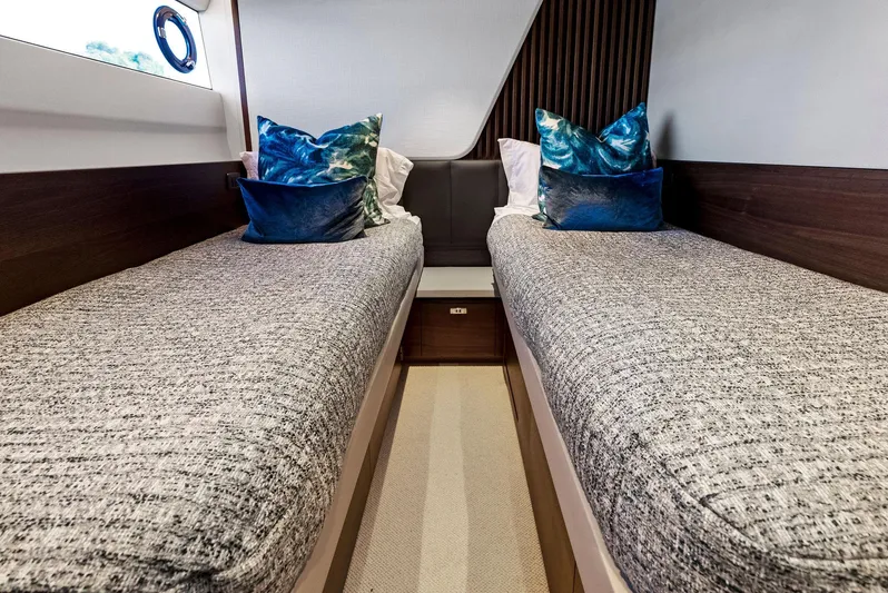 Robri Mar Yacht Photos Pics Luxurious twin cabin interior on 2023 Princess Y72 yacht with modern decor.