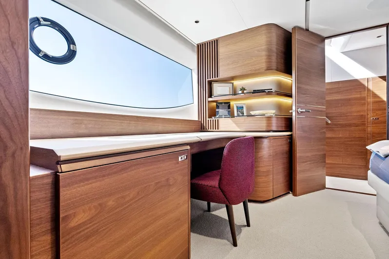 Robri Mar Yacht Photos Pics Luxurious interior of 2023 Princess Y72 yacht with elegant wood finish and modern design.