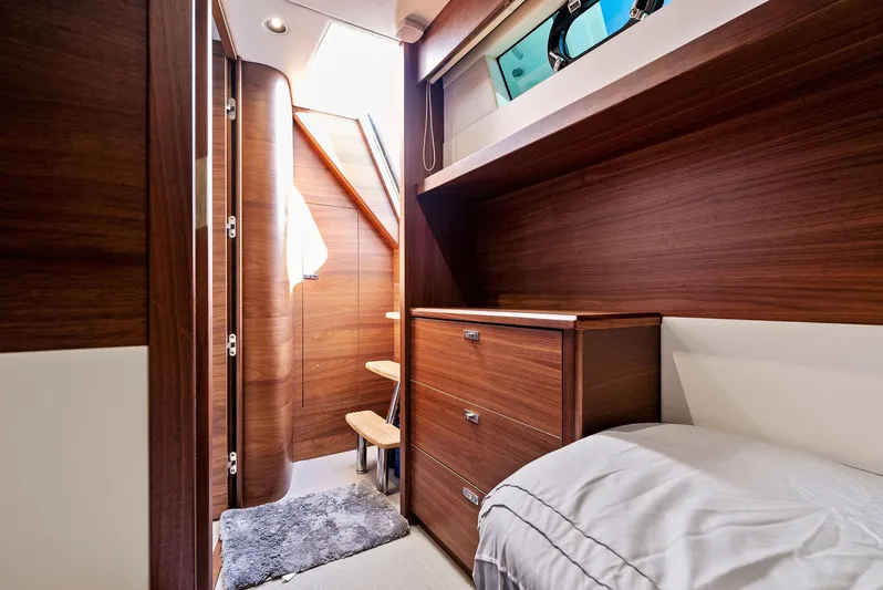 Robri Mar Yacht Photos Pics Luxurious 2023 Princess Y72 yacht cabin with elegant wood finish and modern design.