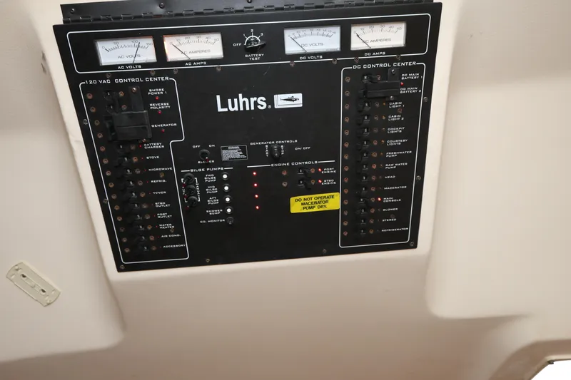 Geranomo Yacht Photos Pics Control panel of a 2007 Luhrs 32 Open boat with gauges and switches.