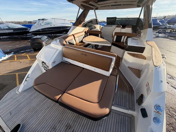  Yacht Photos Pics 2019 Sea Ray 320 Sundancer with luxurious interior and seating area.