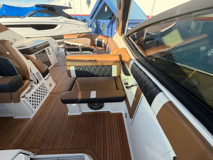  Yacht Photos Pics Interior of a 2019 Sea Ray 320 Sundancer yacht with luxurious seating.